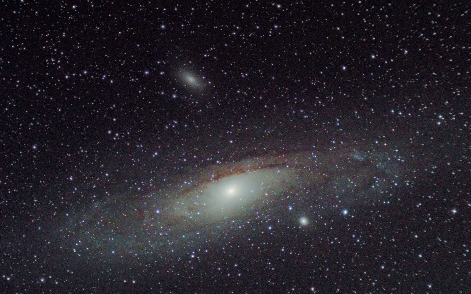 Andromeda Galaxy against a dense star field